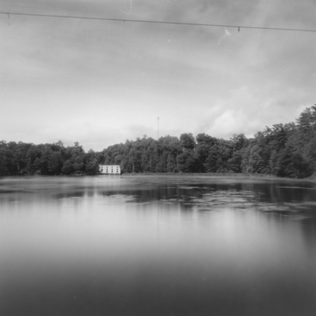 Ondu pinhole, long exposure analog photography on Fujifilm Acros II, part of the Betwixt and Between series exploring psychological landscapes along the Rideau Canal. Location: Jones Fall bypass footbridge, upstream view.
