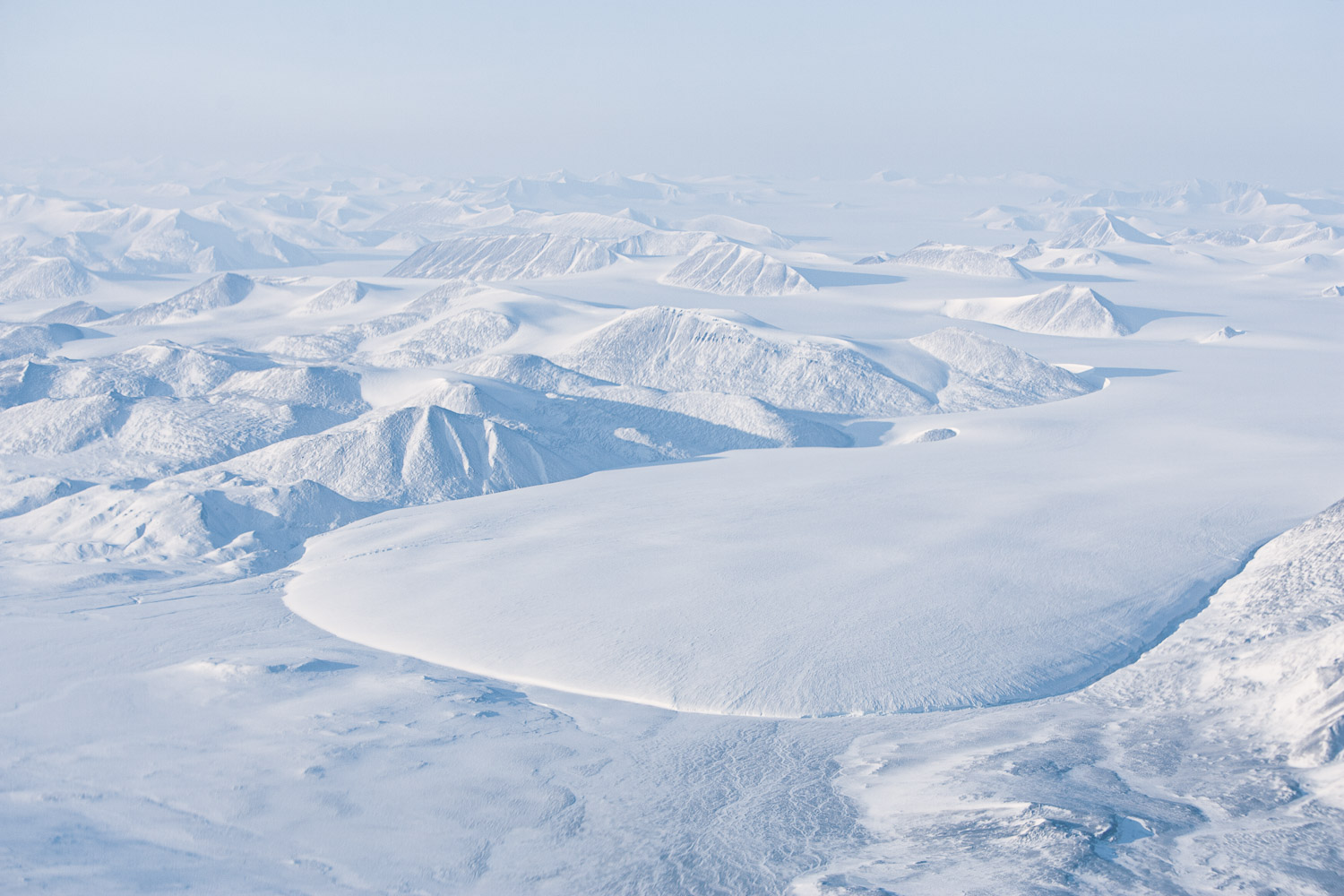 Aerial photo of glacier and mountains on Ellesmere Island, High Arctic, Canada, Op NUNALIVUT 2008.