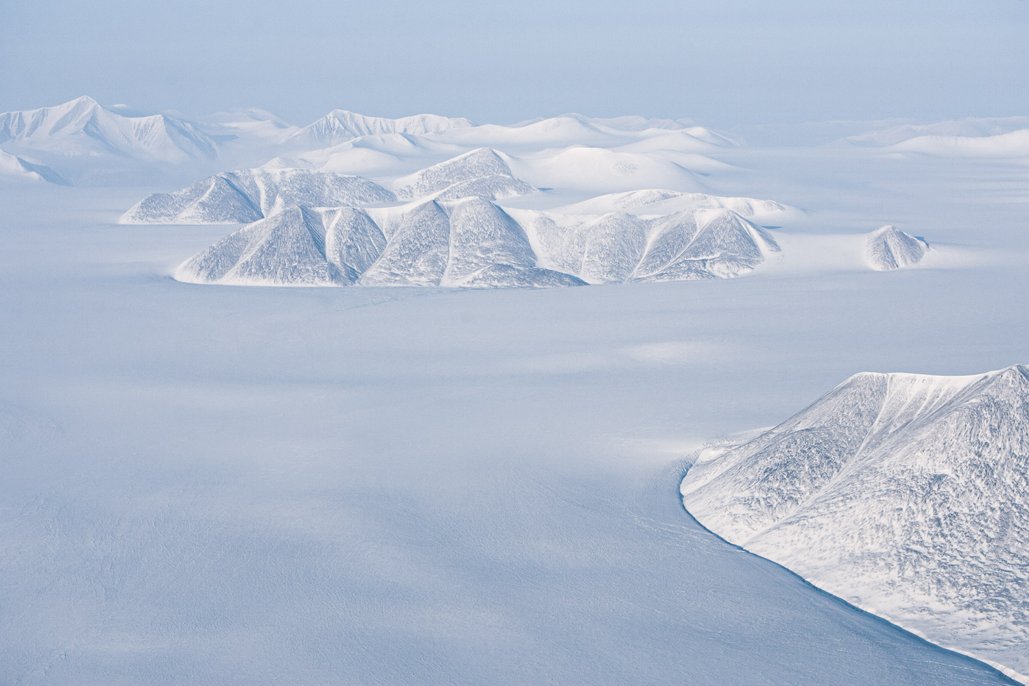 Aerial photo of glacier and mountains on Ellesmere Island, High Arctic, Canada, Op NUNALIVUT 2008.