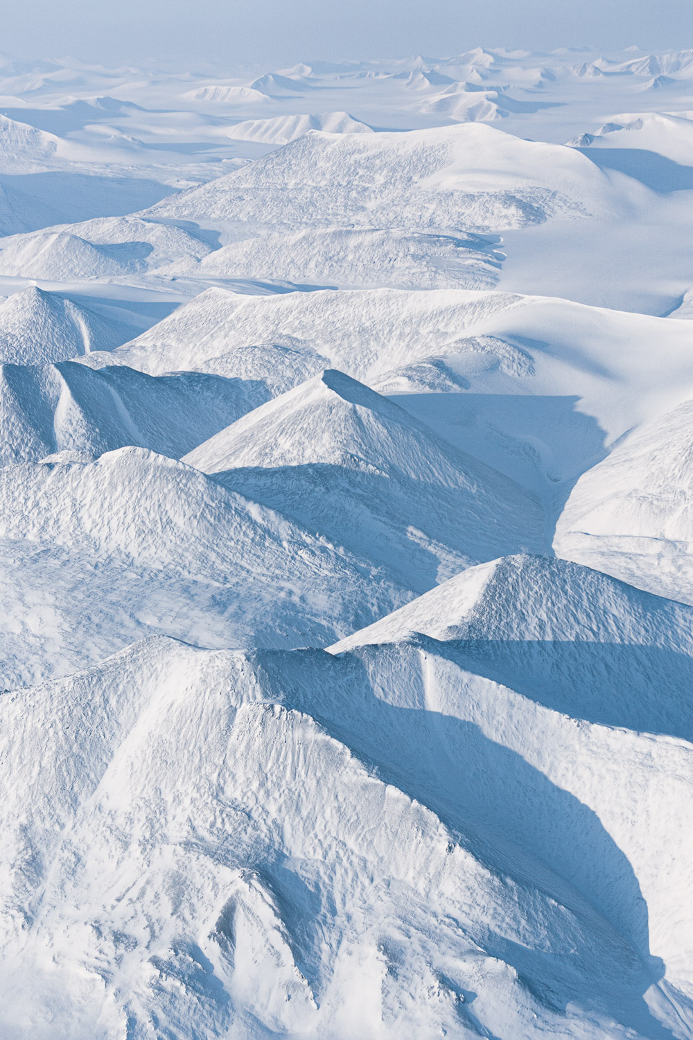 Aerial photo of glacier and mountains on Ellesmere Island, High Arctic, Canada, Op NUNALIVUT 2008.
