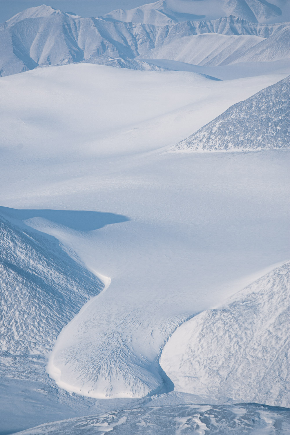 Aerial photo of glacier and mountains on Ellesmere Island, High Arctic, Canada, Op NUNALIVUT 2008.