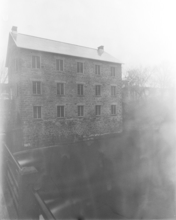 Historic stone mill on the Rideau Canal captured as a pinhole photograph